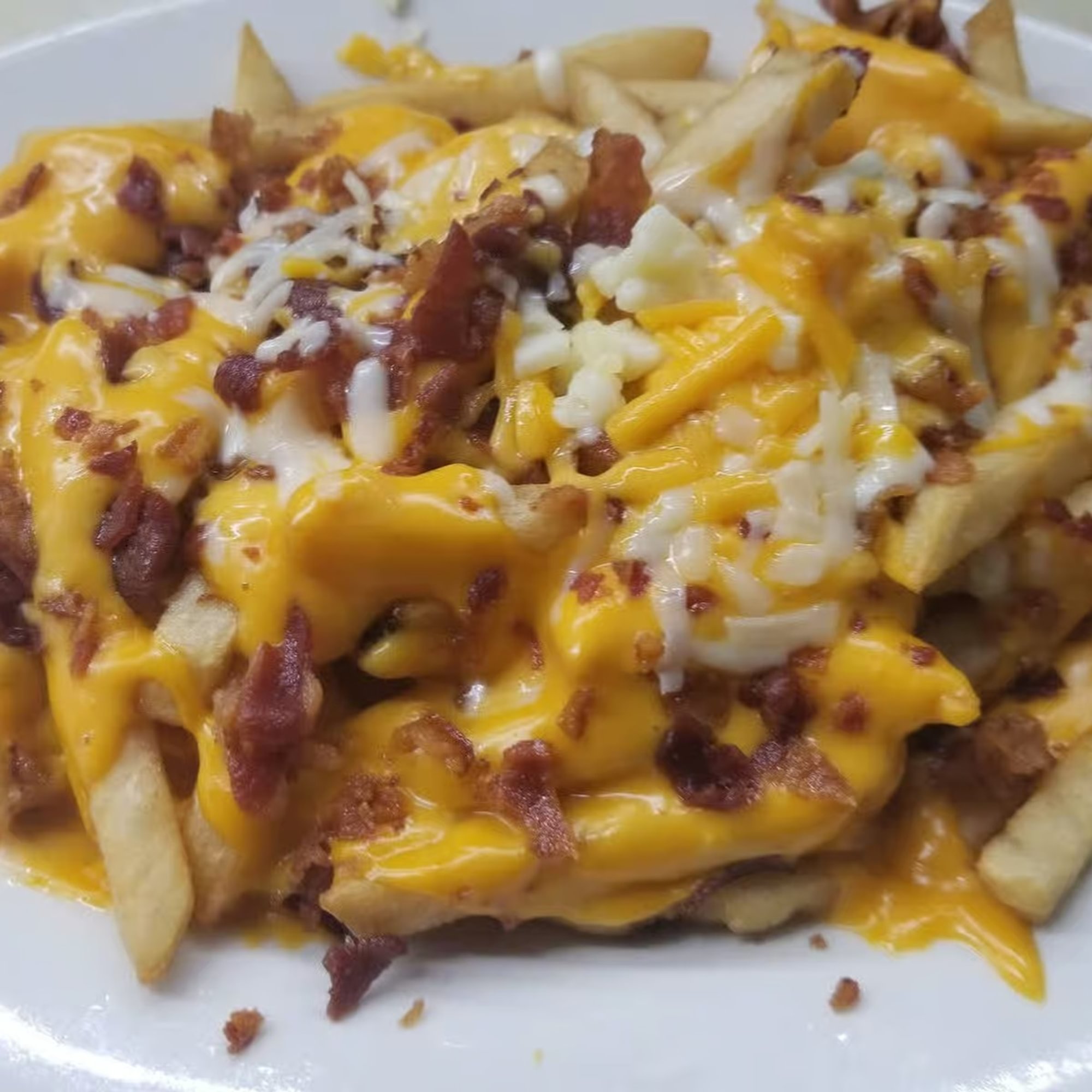 French Fries with Cheese & Bacon