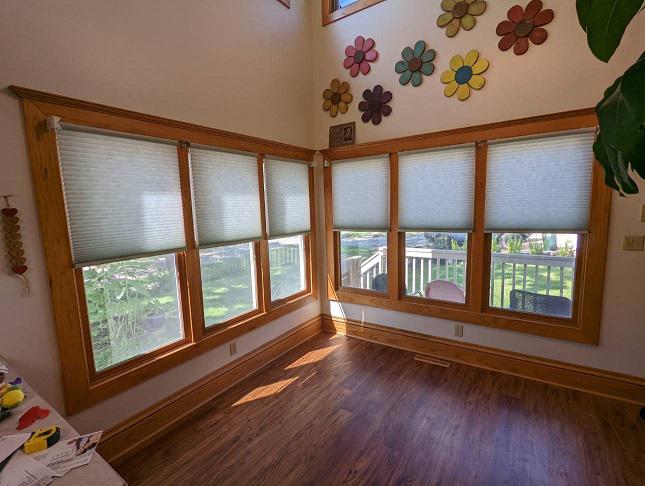 Here in Cedar Falls, we love creating cozy looks. Everything about this space, from our Cellular Shades to the warm wood, says home sweet home!