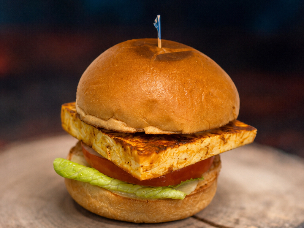 Grilled Paneer Burger (V) (Grilled Paneer Cheese, Lettuce, Tomato, Onion, Pickle, Sharjah Sauce)