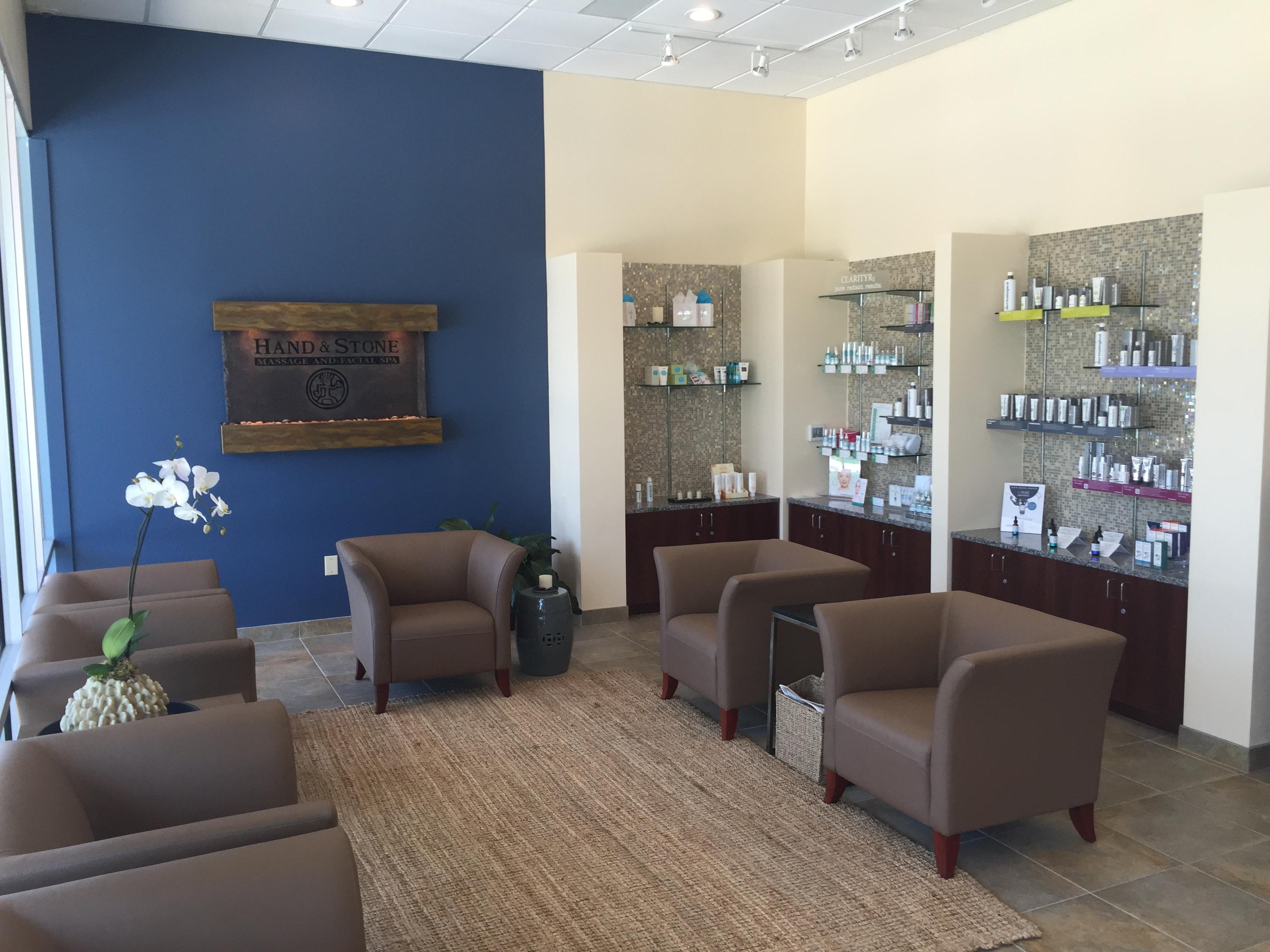 Hand and Stone Massage and Facial Spa Logo