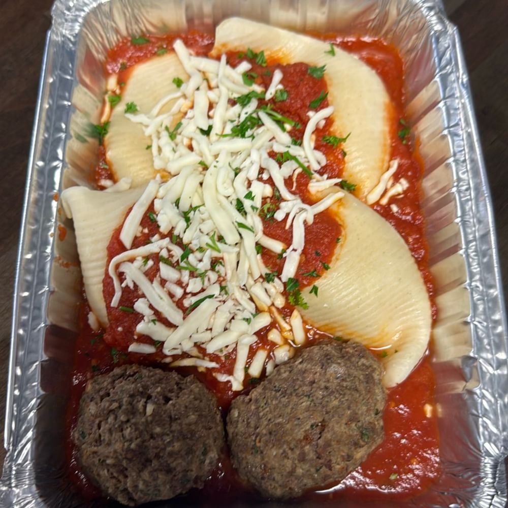 4 Piece Stuffed Shells with 2 Meatballs and Marinara Sauce.
