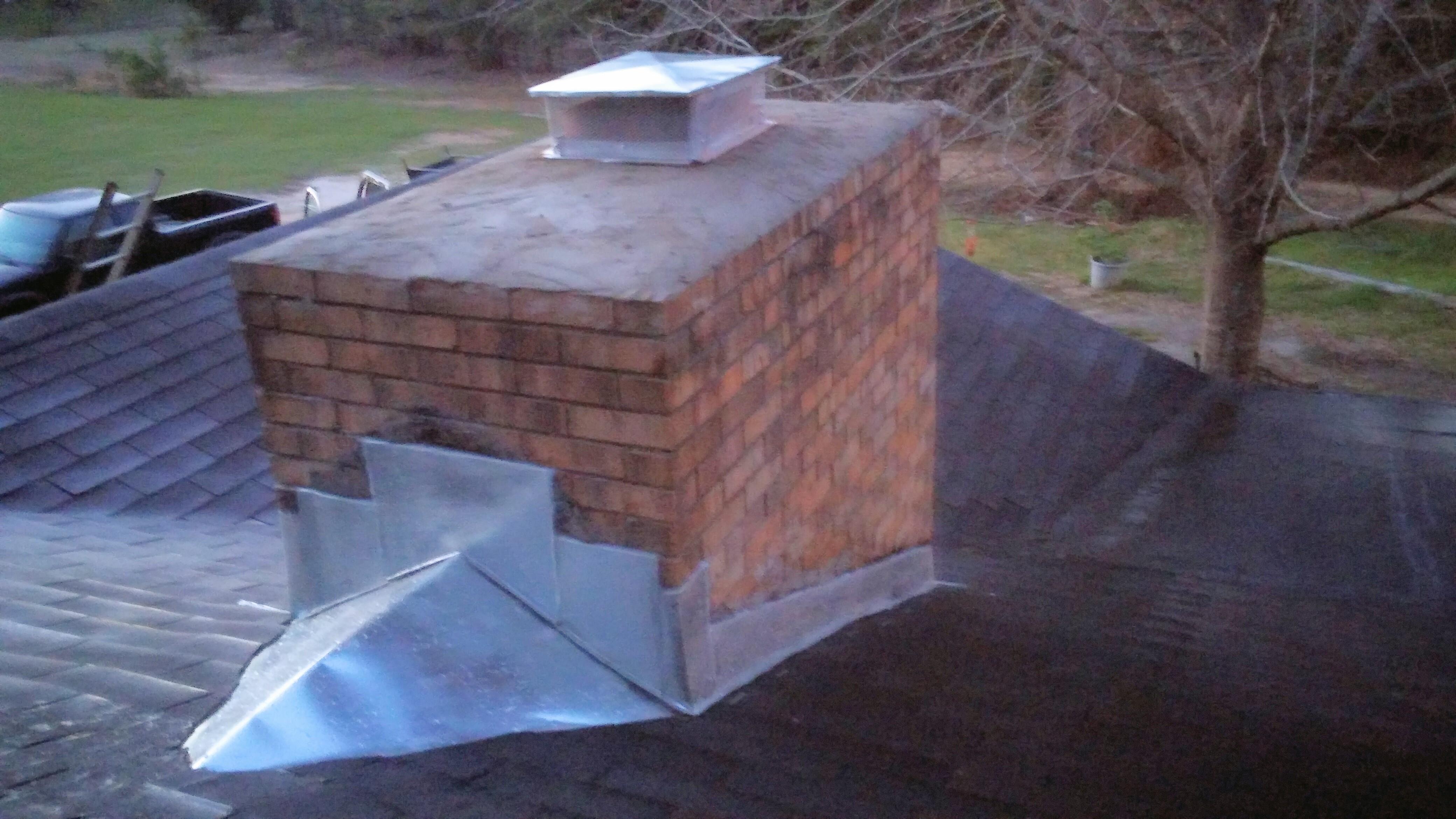 New flashing, galvanized cricket(sadle) and chimney cap repair.