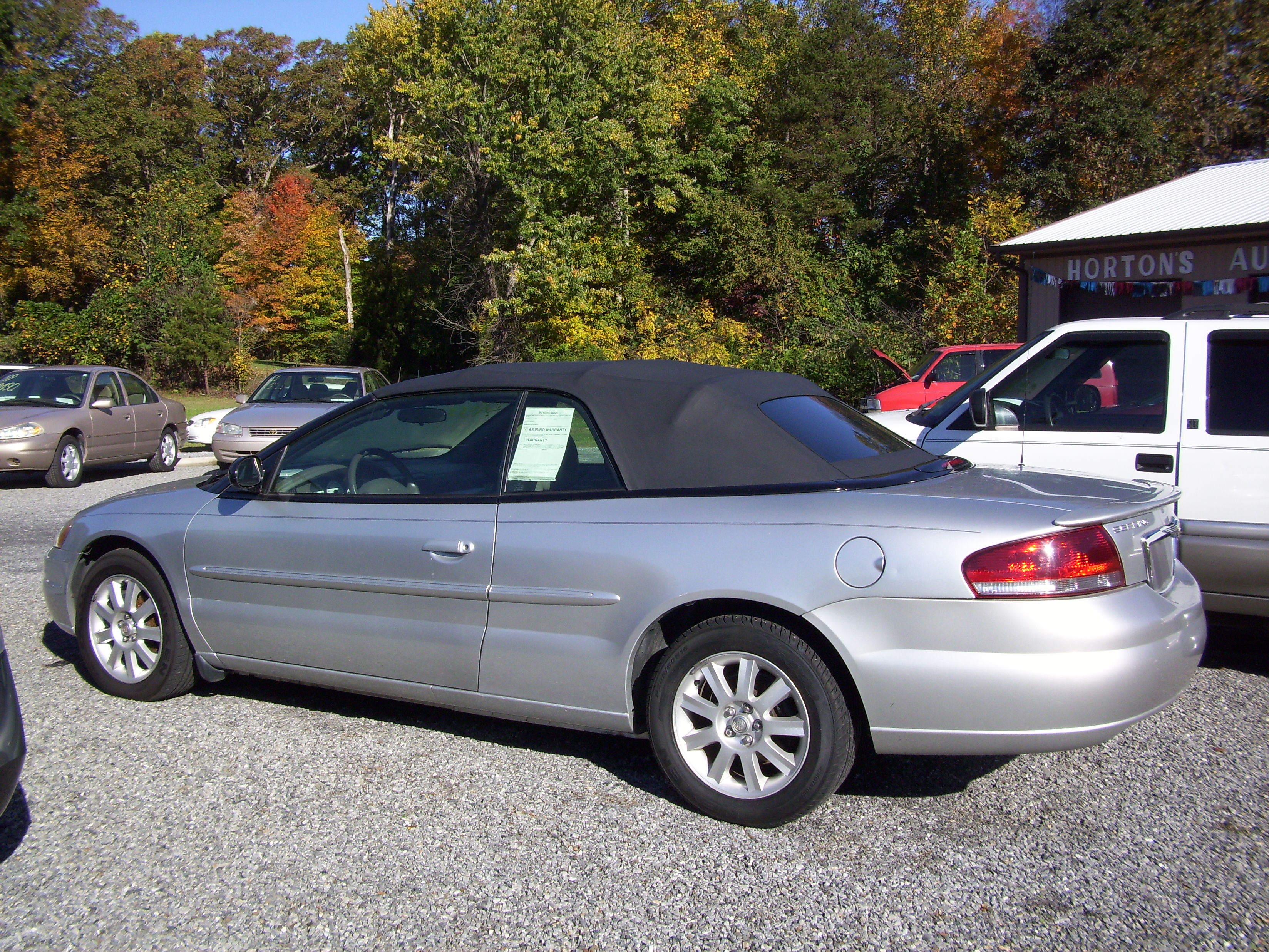 2003 Chrysler Sebring Convertible, Silver w/Black Top, V6, Automatic, Power Windows, 80K miles, Excellent Condition $3,900