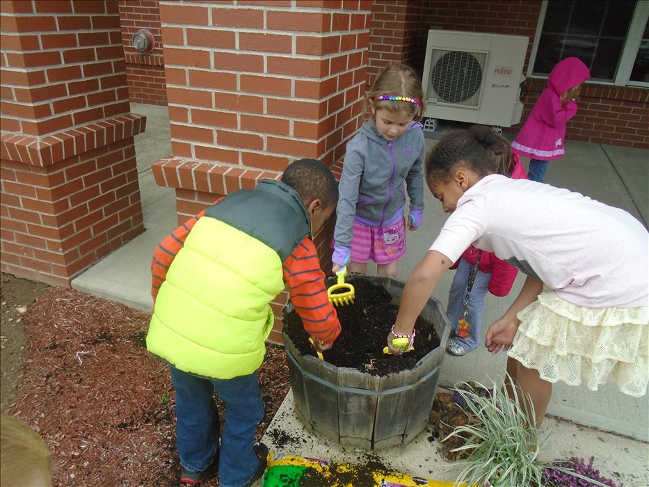 Our School Age class planting on Earth Day!