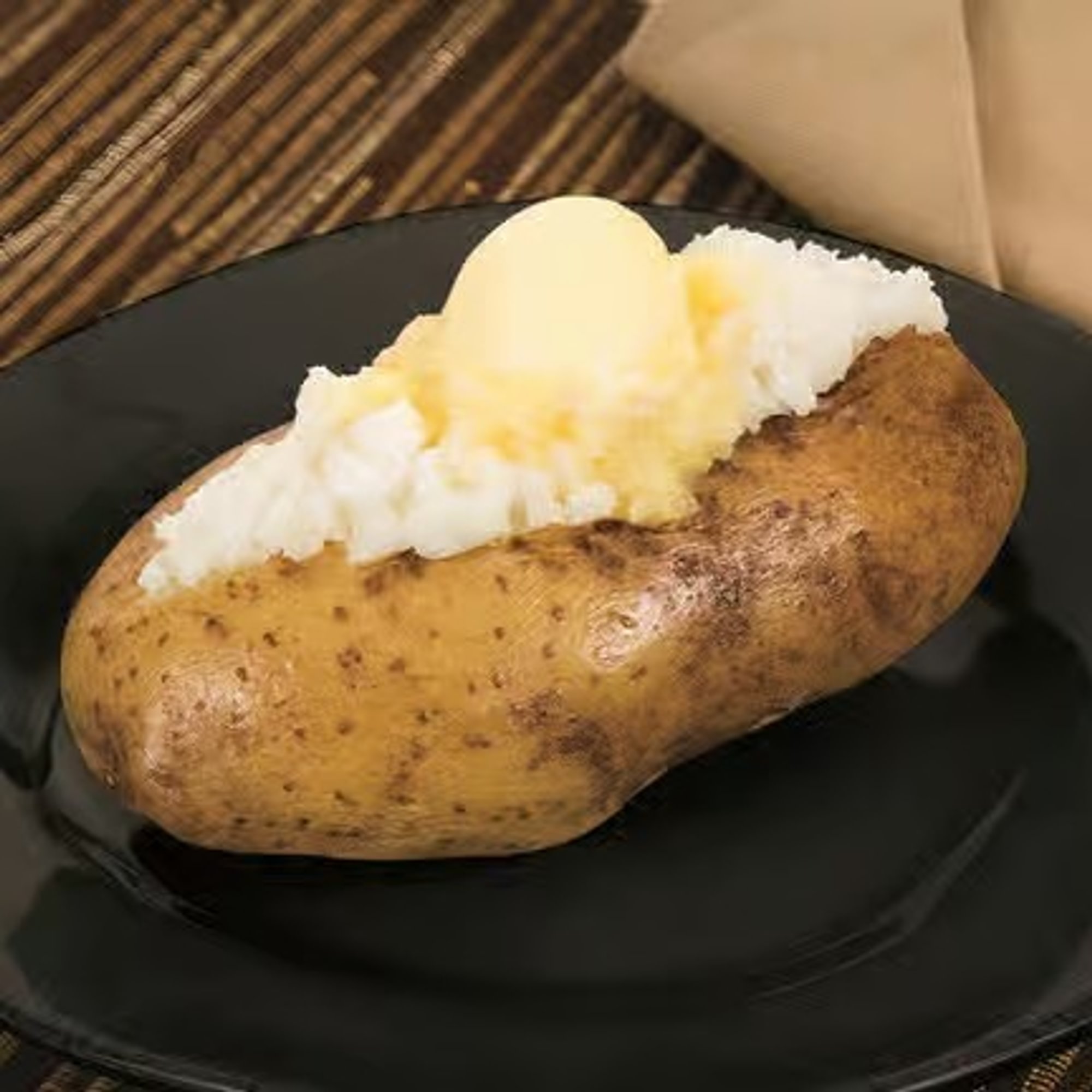 Baked Potato with Buttery Spread & Daisy Sour Cream