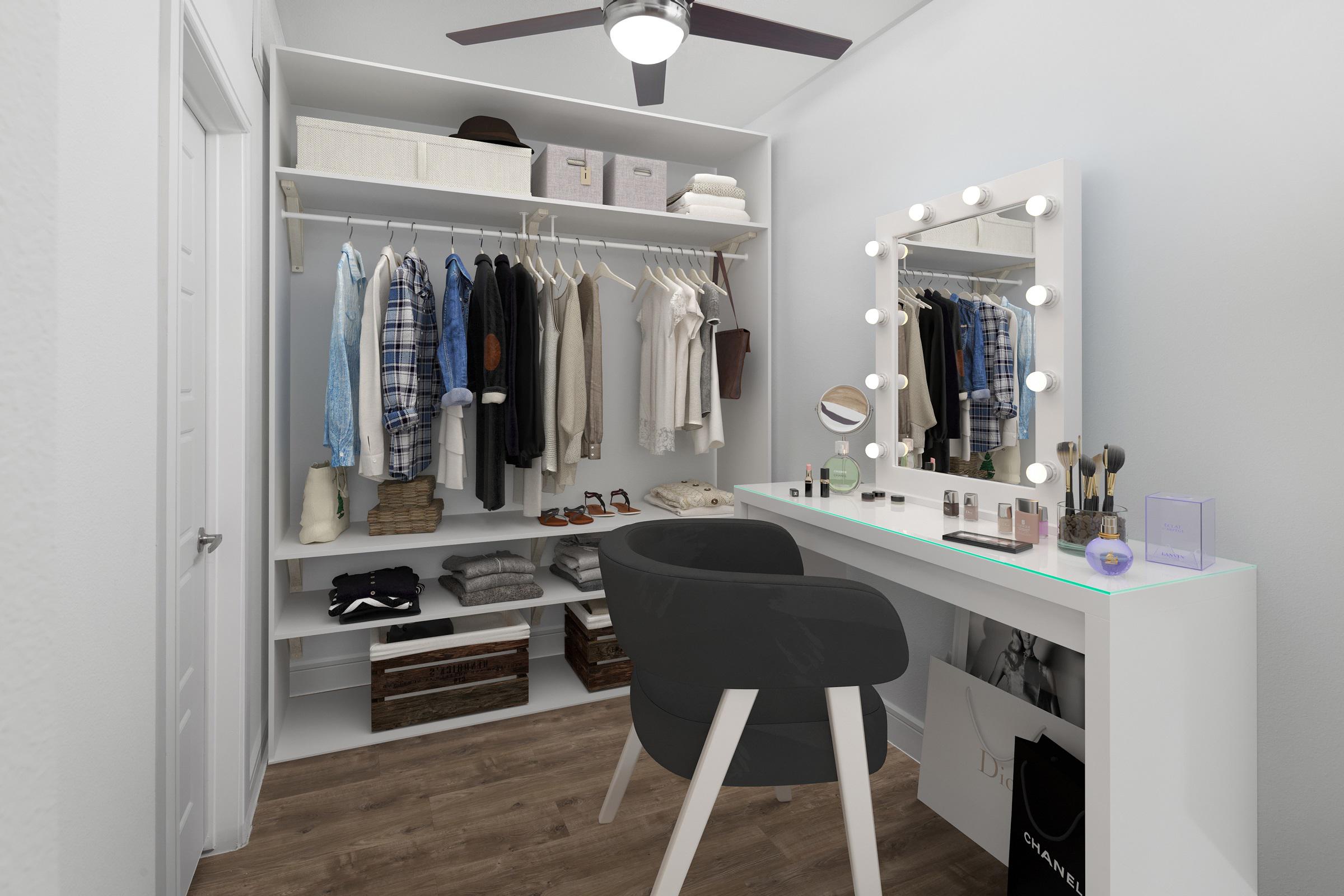 Flex space used as a glam room with a vanity and large wardrobe at Camden Greenville