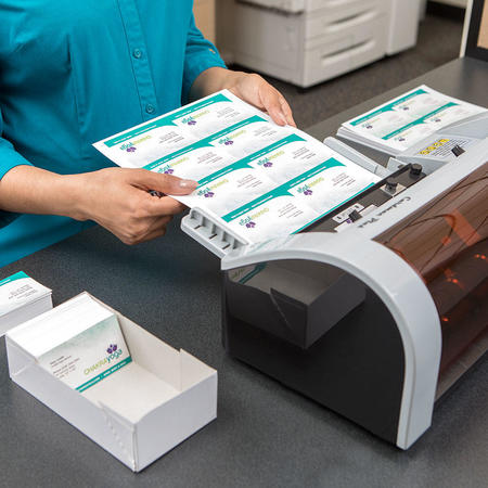 business cards being printed at the ups store