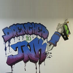 Drenched In Ink LLC Logo