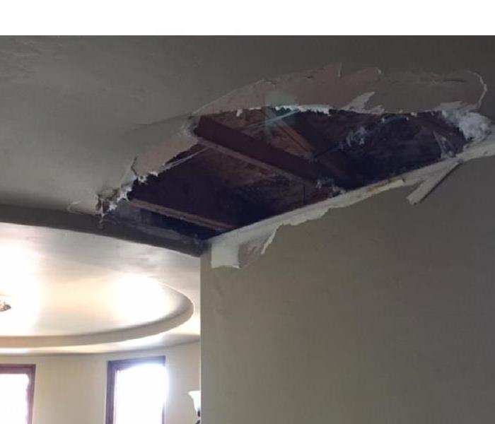 Ceiling damage due to a water loss in a home.