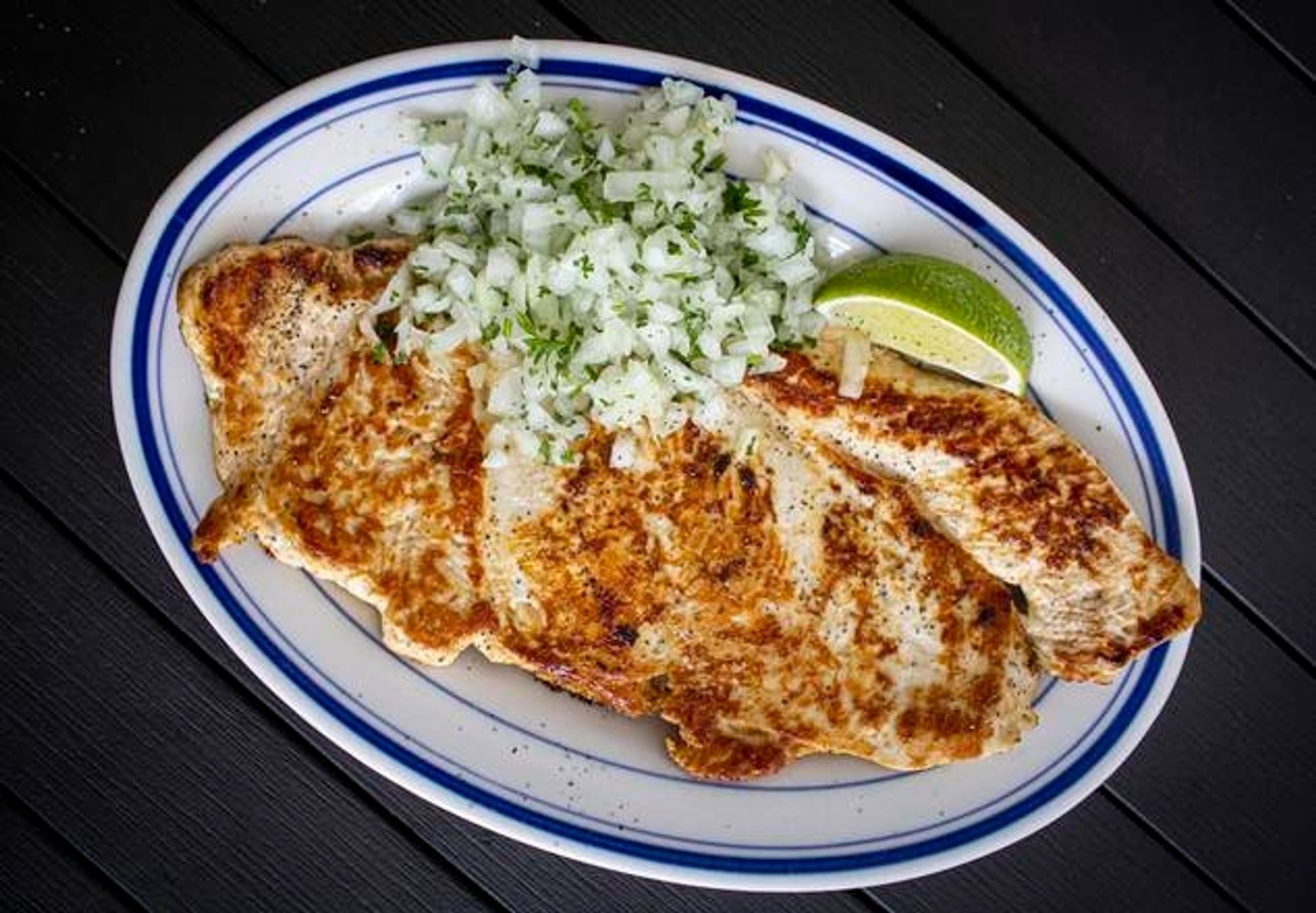 Lunes- Bistec De Pollo a la Plancha / Grilled Chicken Breast