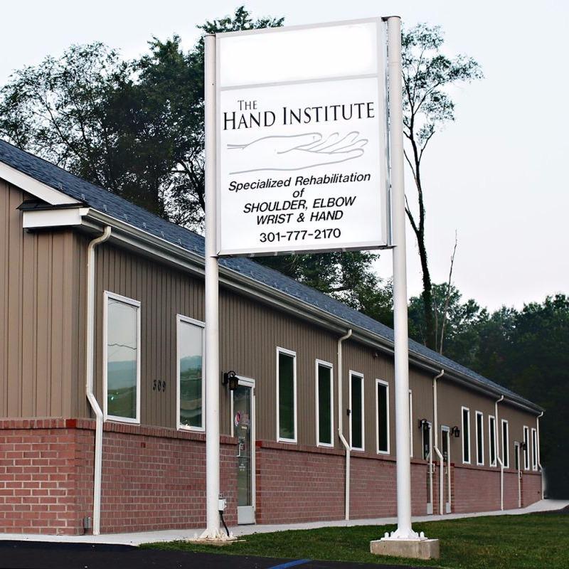 The Hand Institute LLC Logo