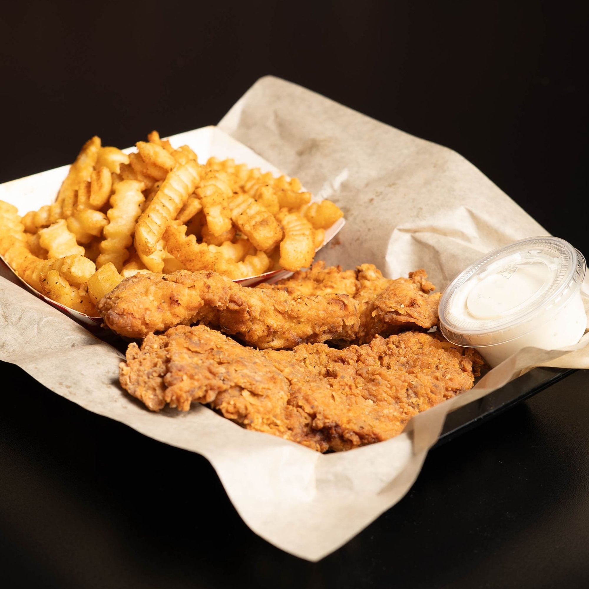 2 Handbreaded Tenders w/ Fries