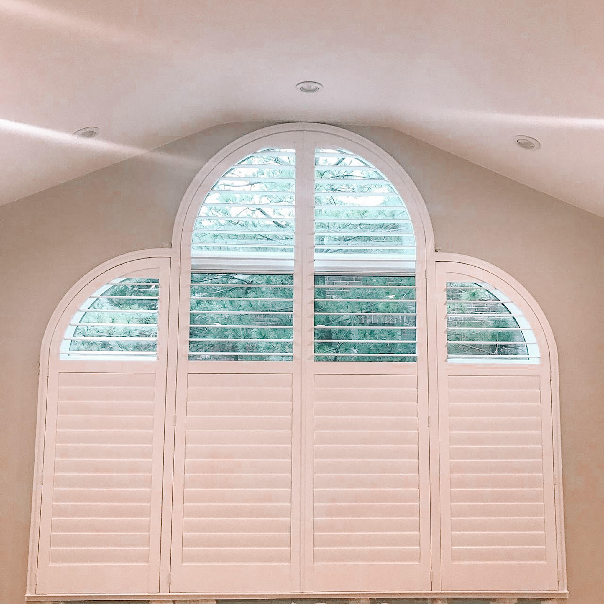 No matter the shape of your windows, we can help! These custom shutters in Manalapan, NJ were made to fit these arched windows perfectly!