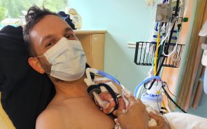 David Glover Holds Baby Daisy