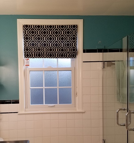 Dress up a bathroom with a fabric Roman Shade