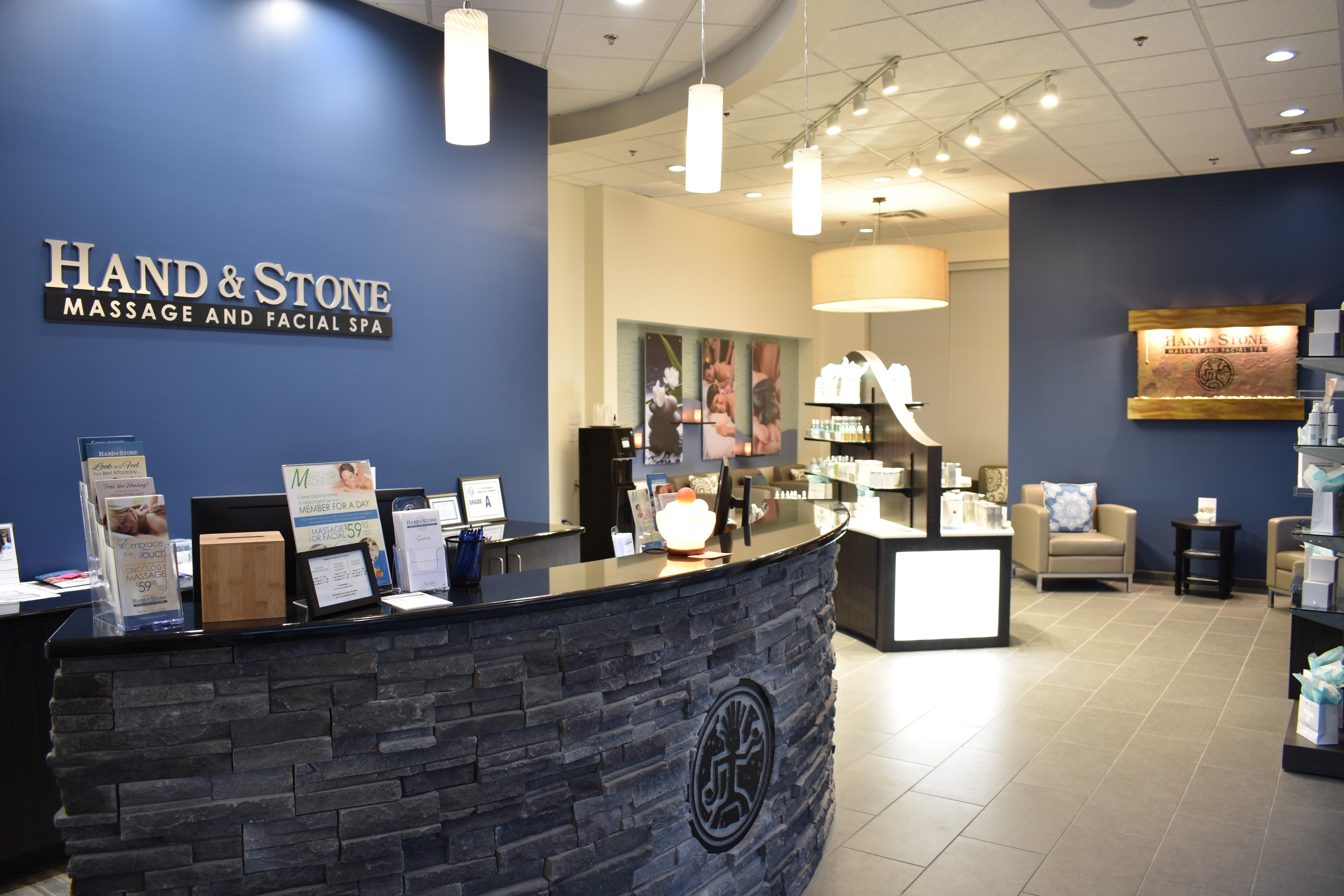 Hand and Stone Massage and Facial Spa Logo