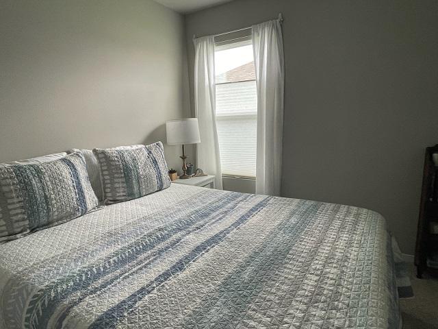 We can't stop admiring the beauty of this bedroom in Collinsville that is brought out by our Top-Down, Bottom-Up Cellular Shades. You can pair these shades with your existing window treatments to give an effortless designer look.