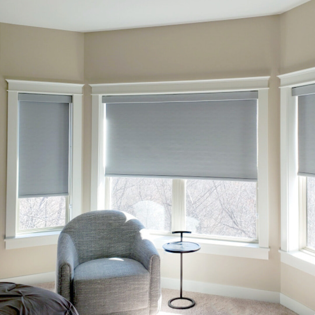 Roller shades for a bay window