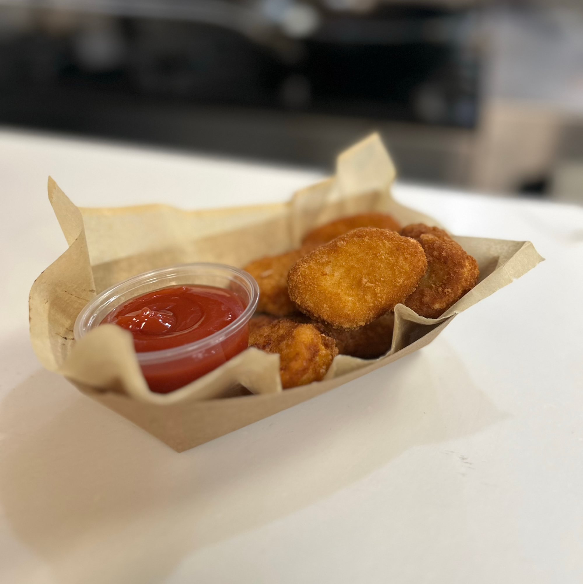 (6) CHICKEN NUGGETS