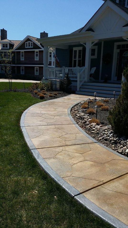 Beautiful walkway with concrete overlay done by NM Construction Group in Hoover, AL. 