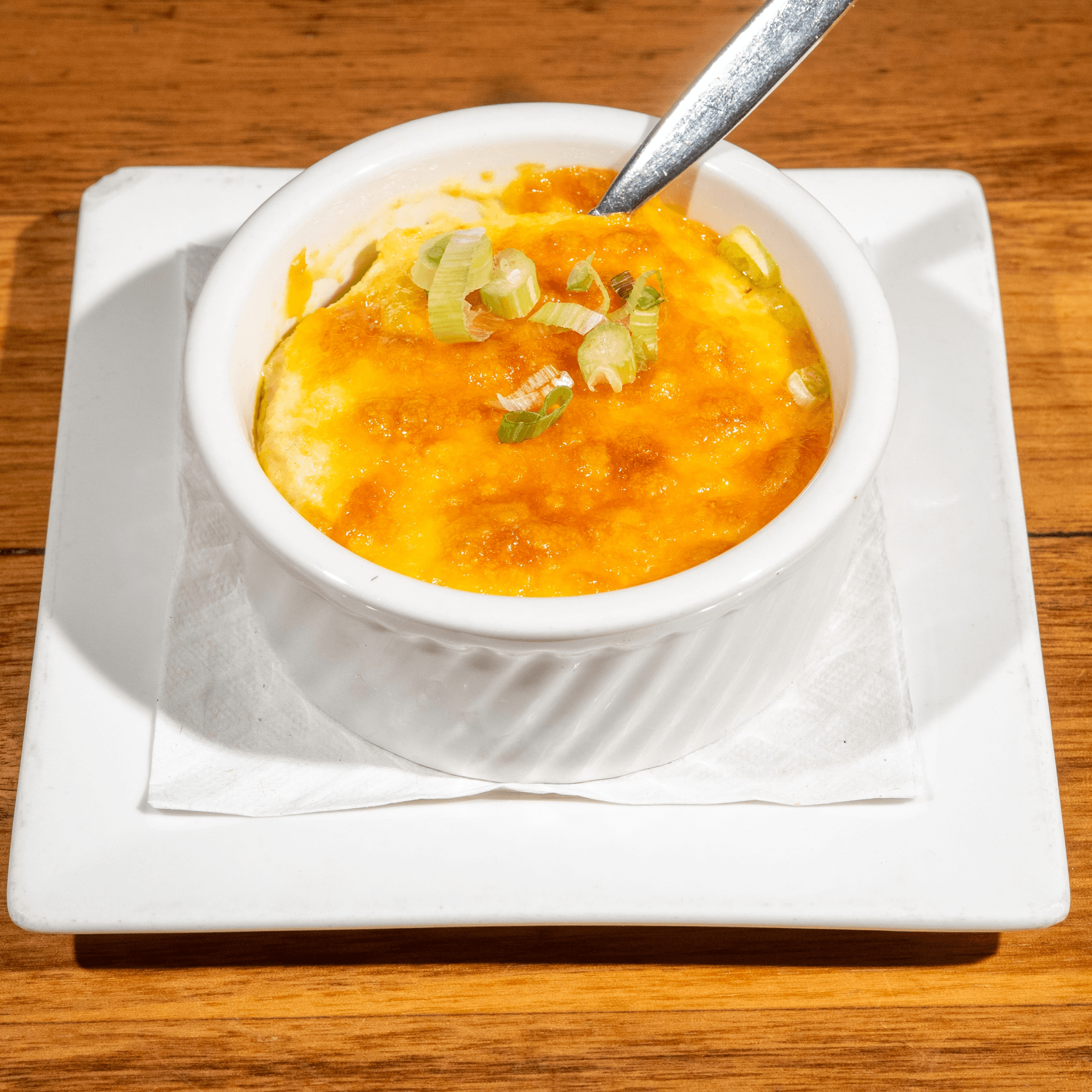 Seafood Cheddar Grits with Crab and Lobster Broth