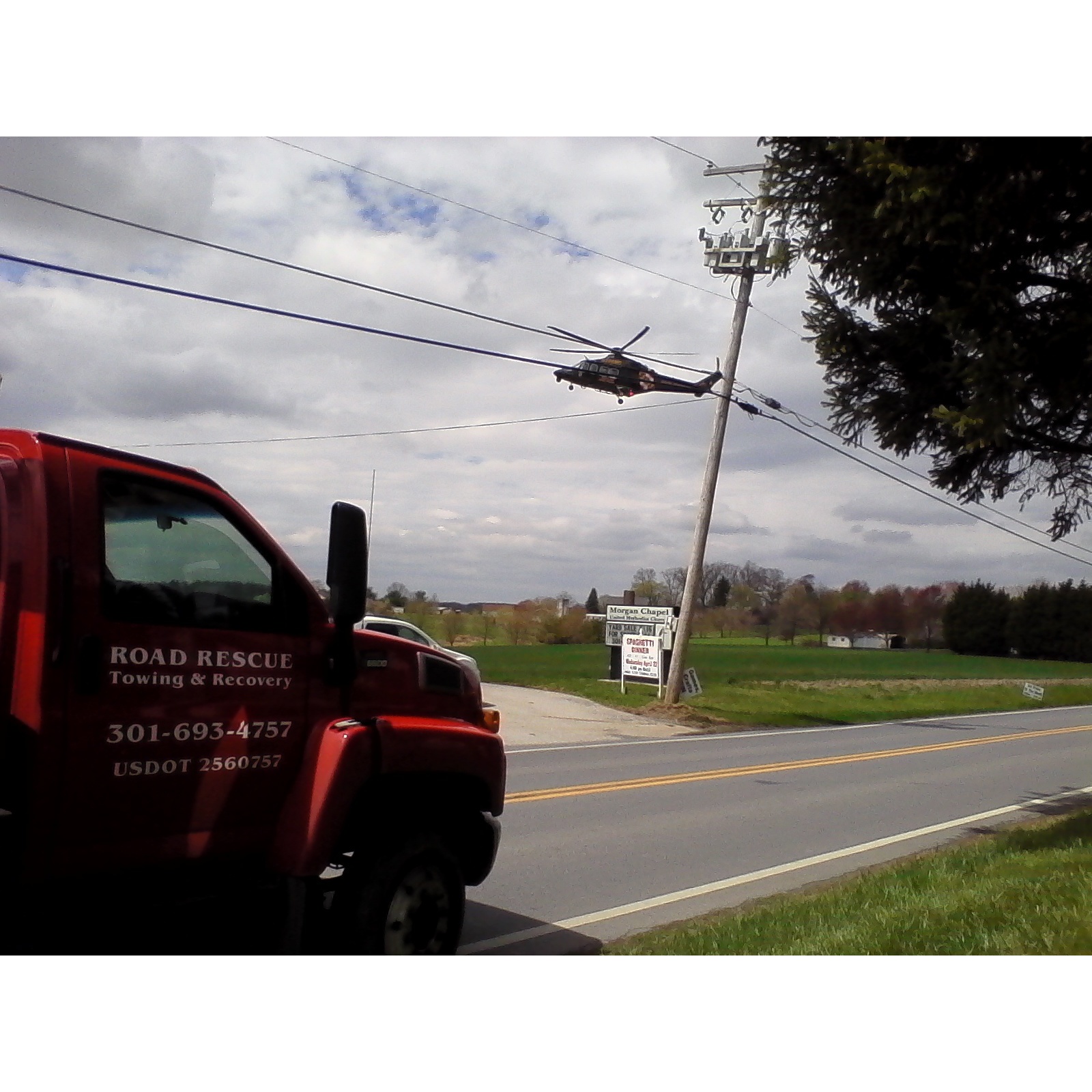 ROAD RESCUE Towing  and  Recover LLC Logo