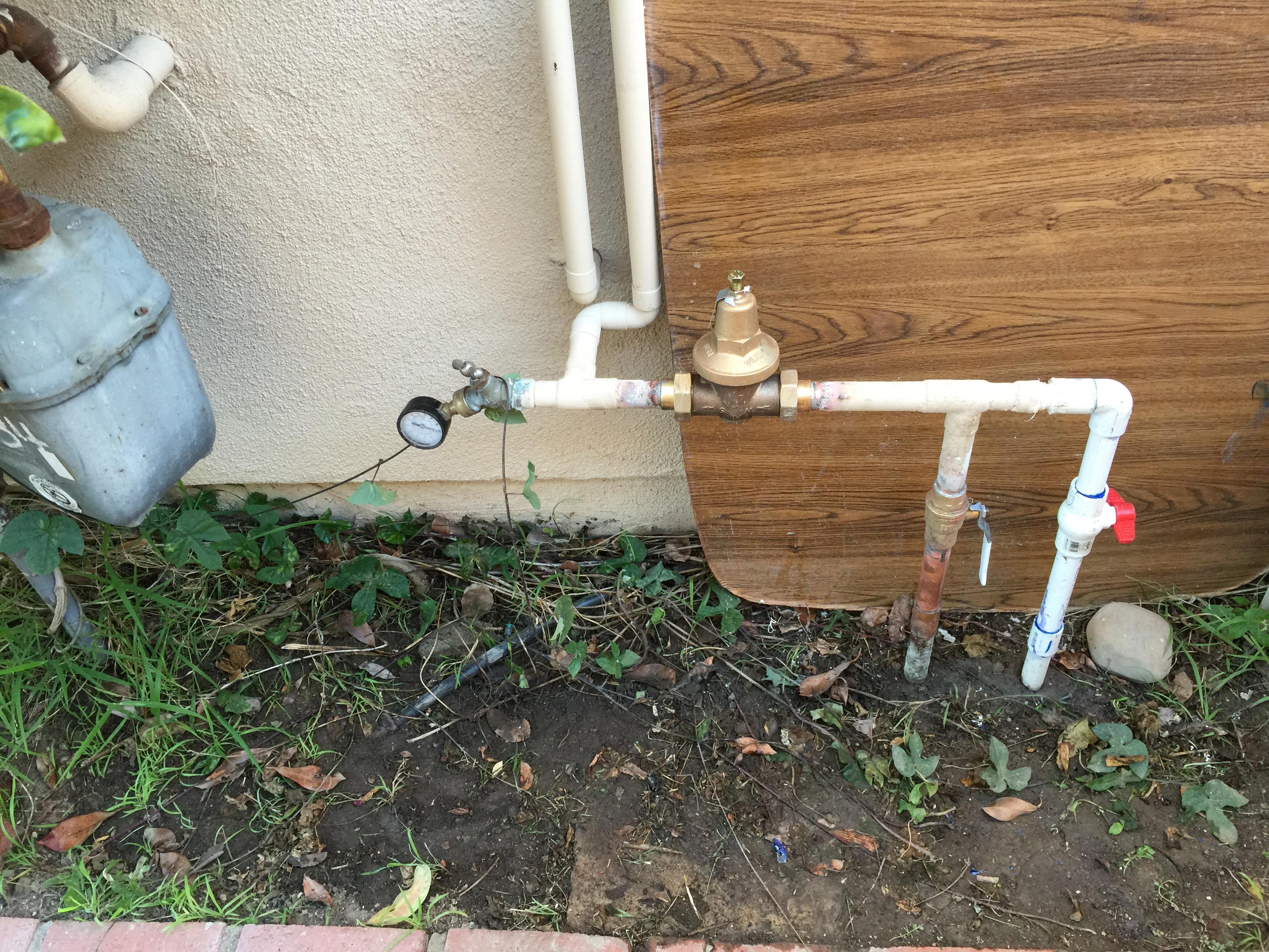 Install pressure regulator and Shut off valves for water main and irrigation system