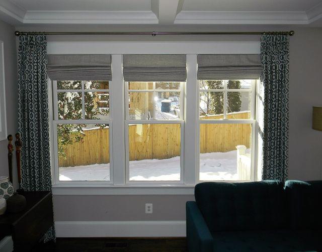 Capture classic elegance in your living room with Roman Shades paired with Custom Inspired Draperies by Budget Blinds of Arlington & Alexandria. This lovely home looks lovely even on the brightest days with these decorative window treatments.  BudgetBlindsArlingtonAlexandria  RomanShades  CustomInsp