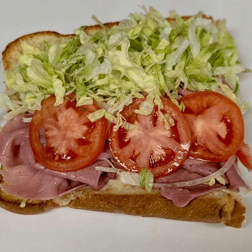 #29 Half Corned Beef & Cheese Sub.