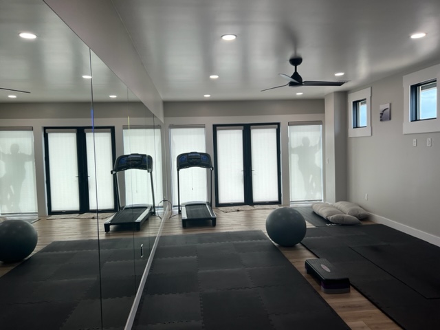 Light filtering roller shade for a exercise room in Leander