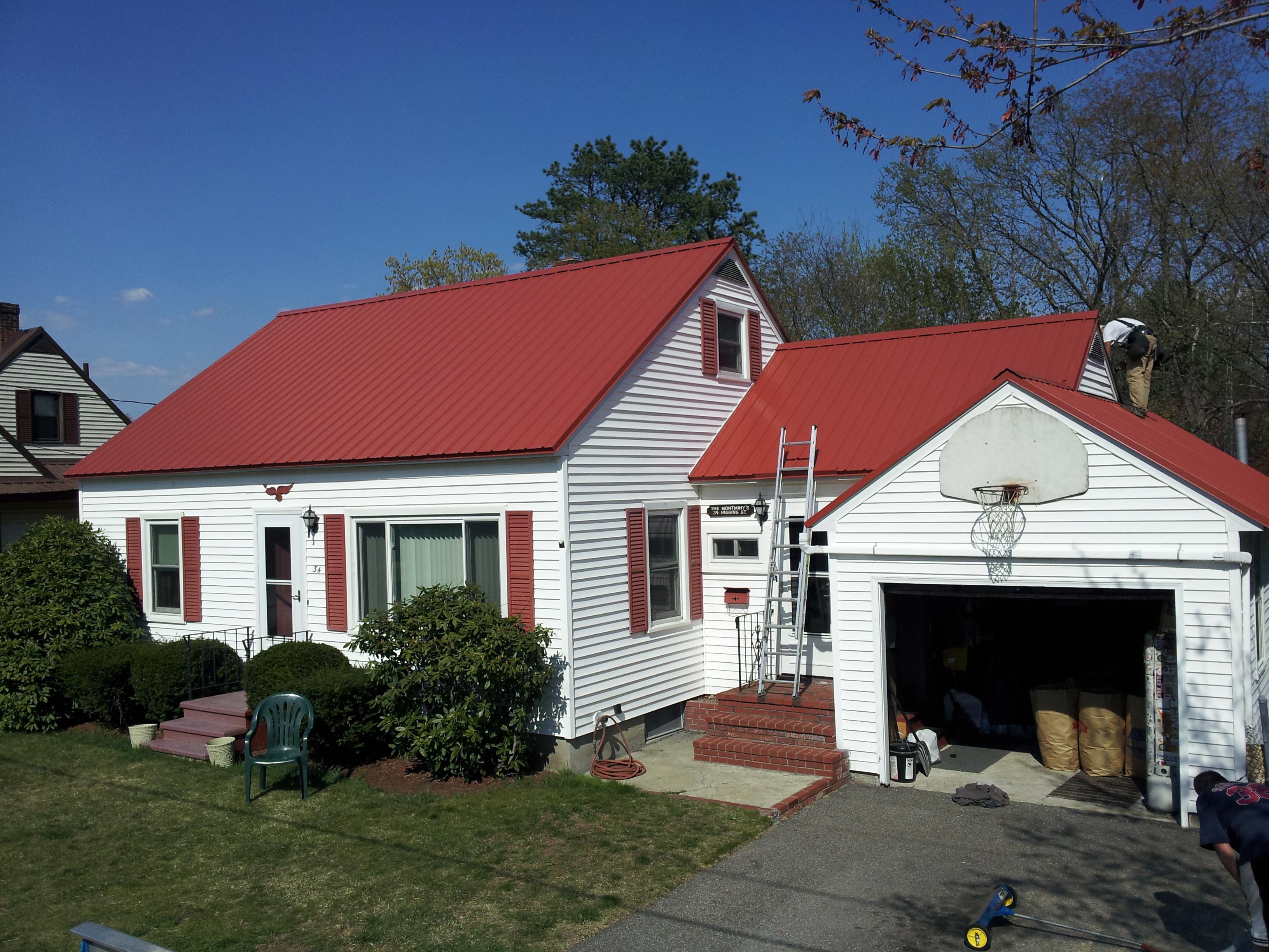 For this beautiful cape with attached garage, we chose to go with ABC Imperial Rib metal roofing. Complete lifetime paint warranty. 