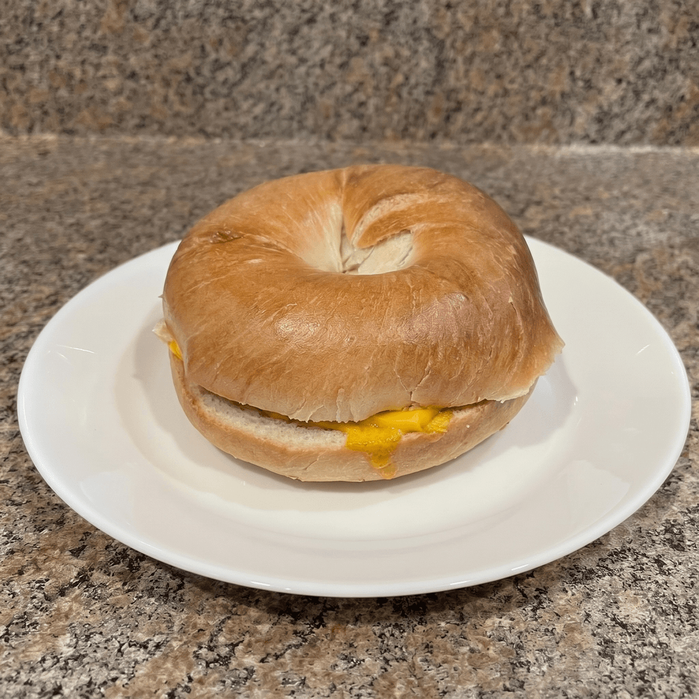 2 Eggs, Meat & Cheese Sandwich with Hash Browns