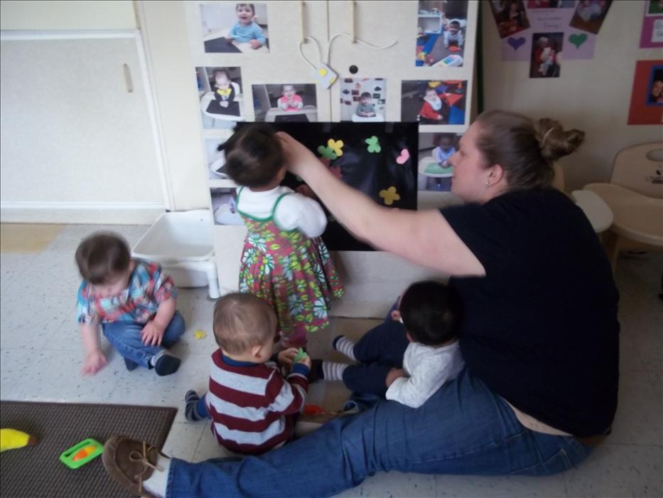 Miss Tiffany and all of our teachers are always on the floor interacting with the children, teaching them and fostering their development.