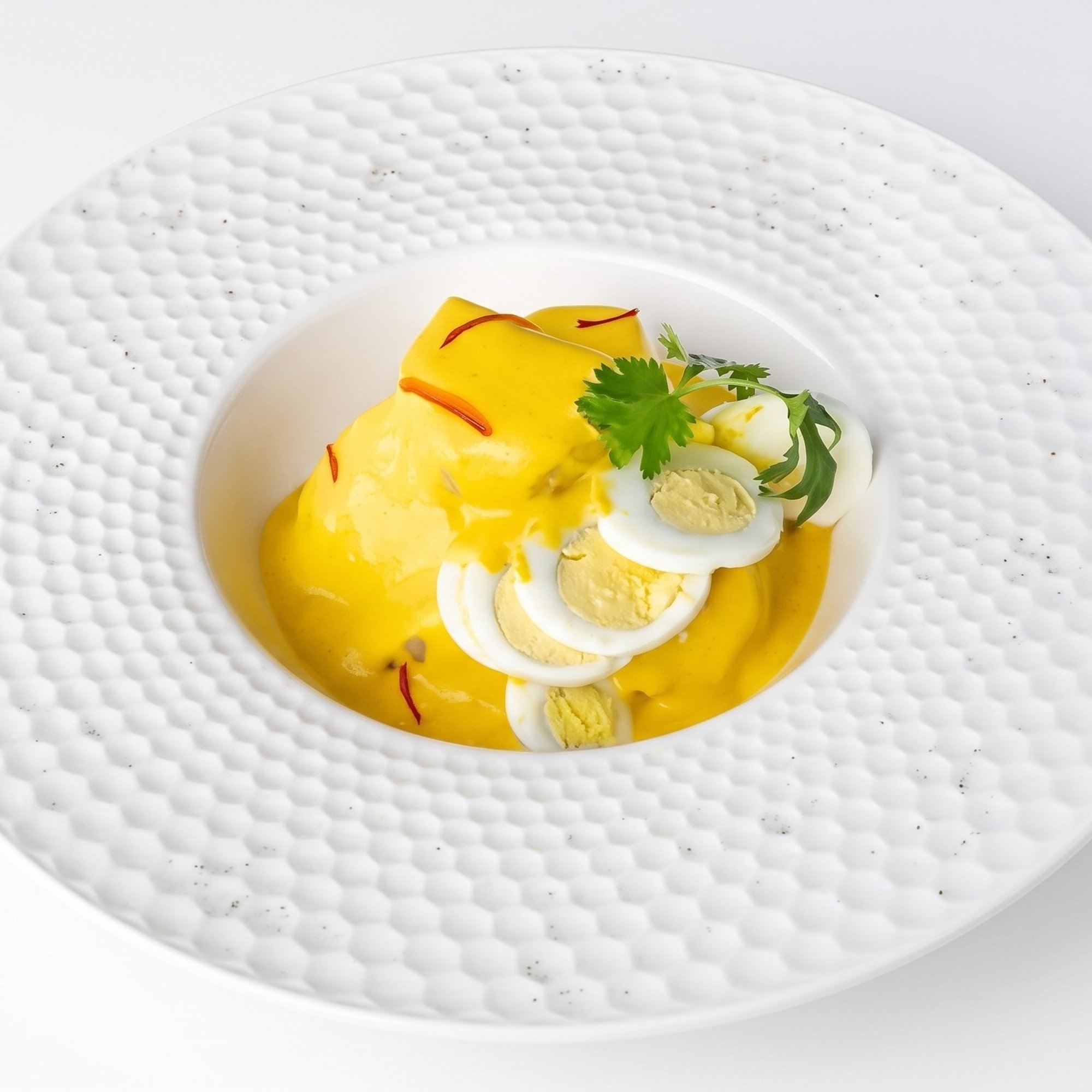 Papa a la Huancaína [Potatoes in Creamy Pepper & Cheese Sauce]