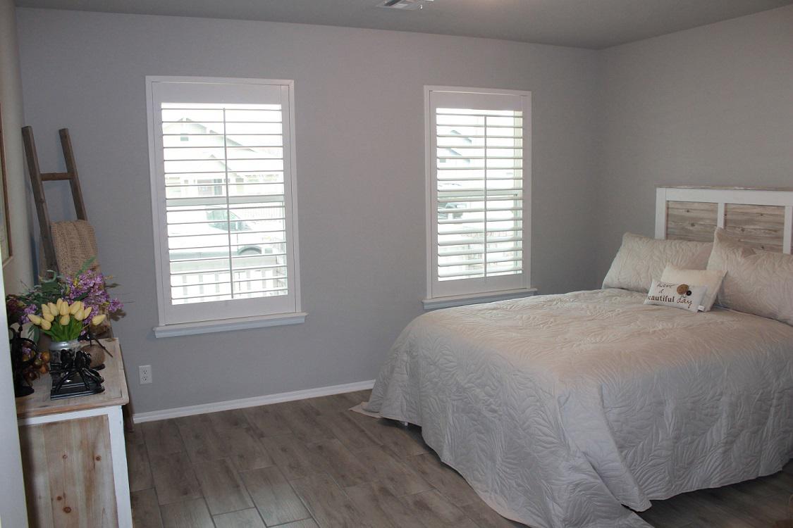 Wow, how dreamy is this bedroom in Collinsville, OK? Our Shutters just adds to the overall calm aesthetic of the room whilst giving you the option to have light or complete privacy - ideal for the bedroom.  BudgetBlindsOwasso  Shutters  CollinsvilleOK  FreeConsultation  Shutters