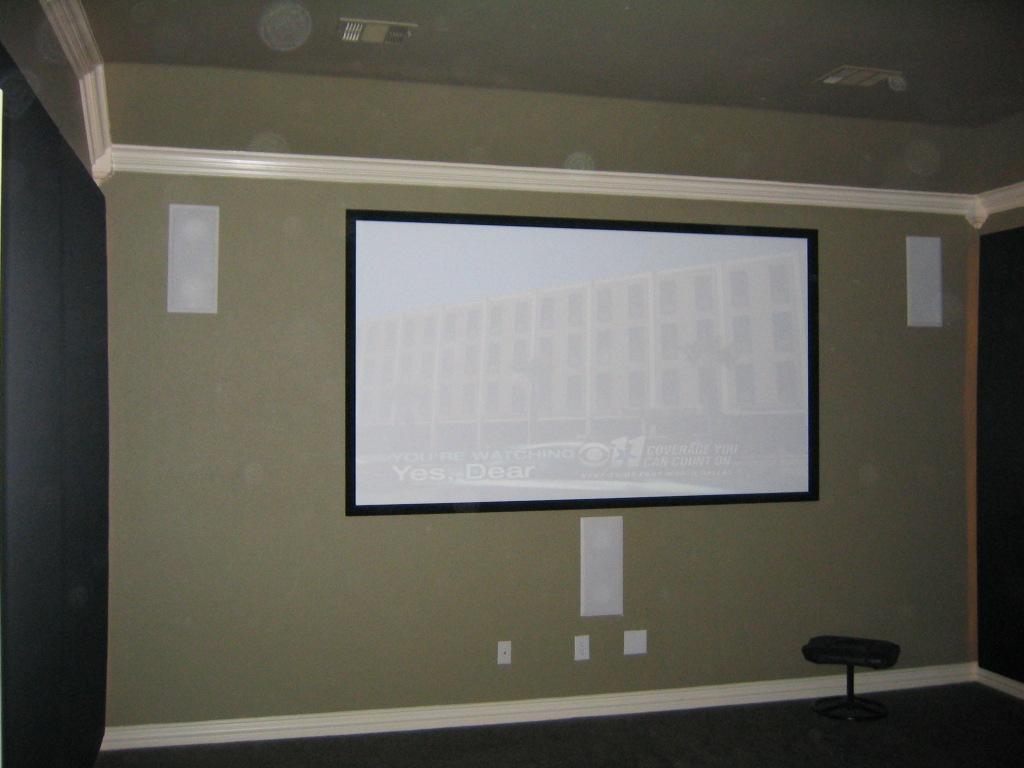 Klipsch R-5502-W II in-wall 7.1 surround sound theater with Screen Innovations and projector.