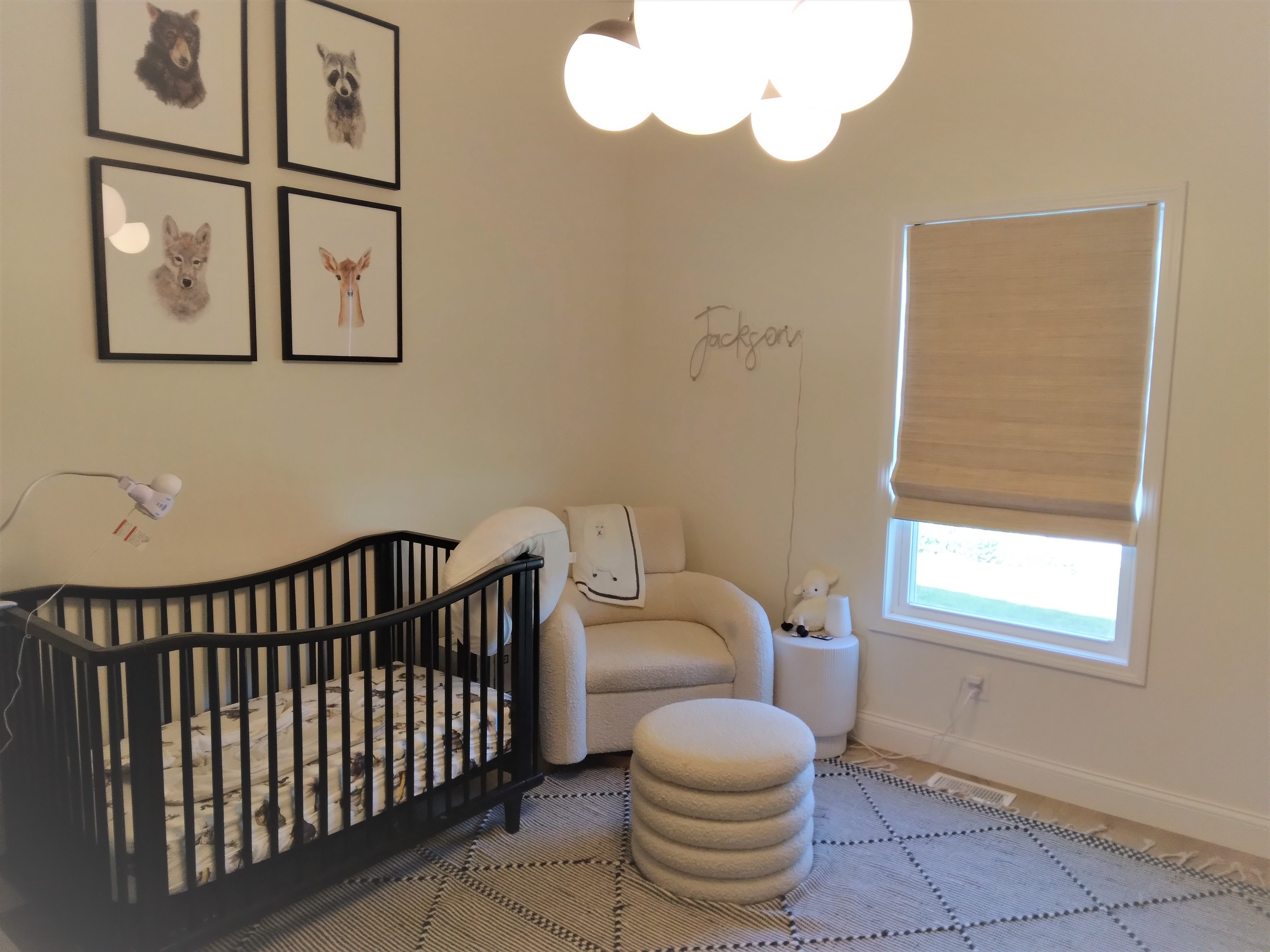 Cordless blackout natural shade in baby nursery.  BudgetBlinds  WindowCoverings  NaturalShades  SpringfieldIllinois