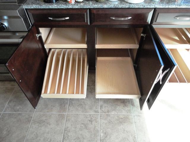 Pan Divider with extra Trays in Base Cabinet.