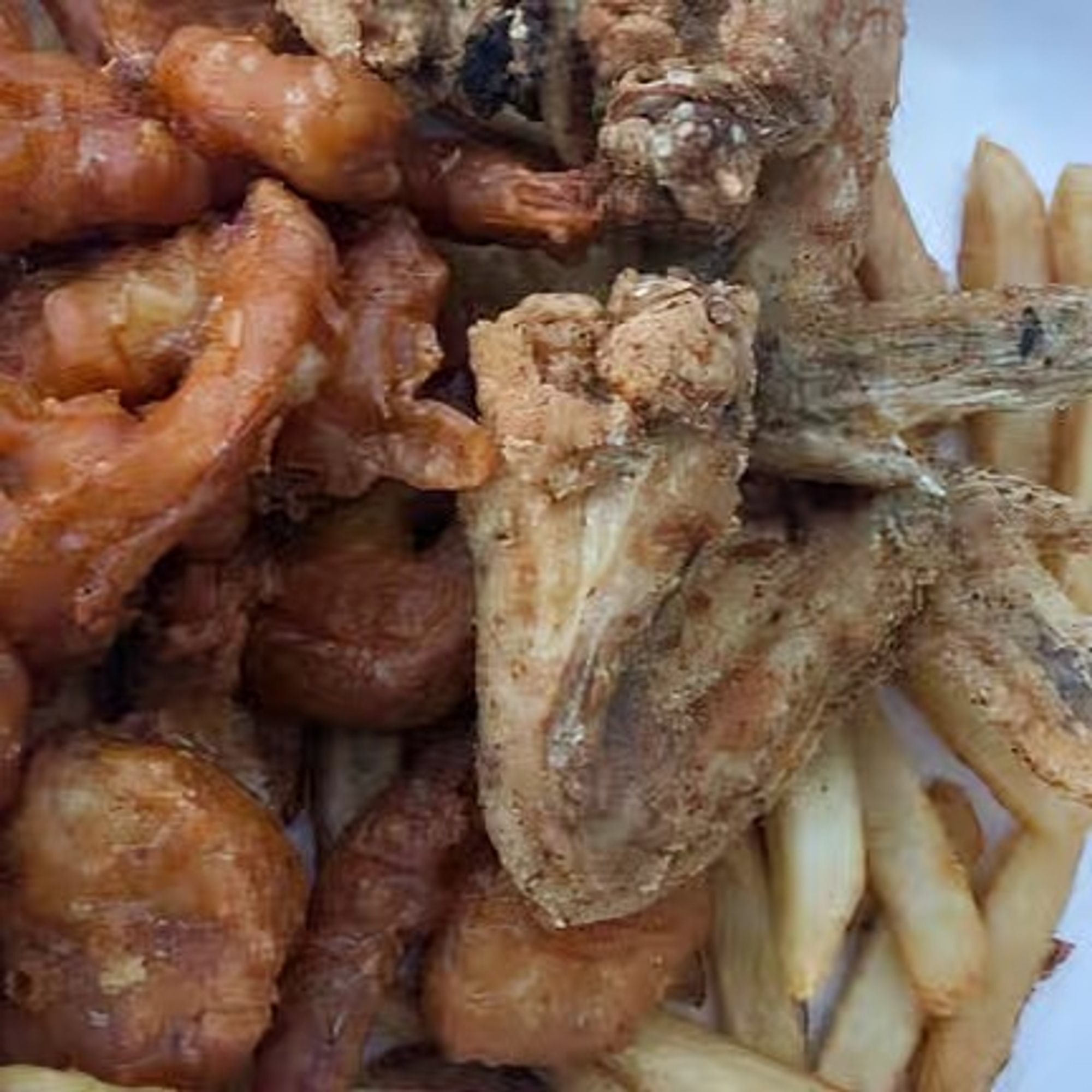 3 Whole Wings or 5 Wing Dings, 20 Large Shrimp or 10 Jumbo Shrimp with Fries