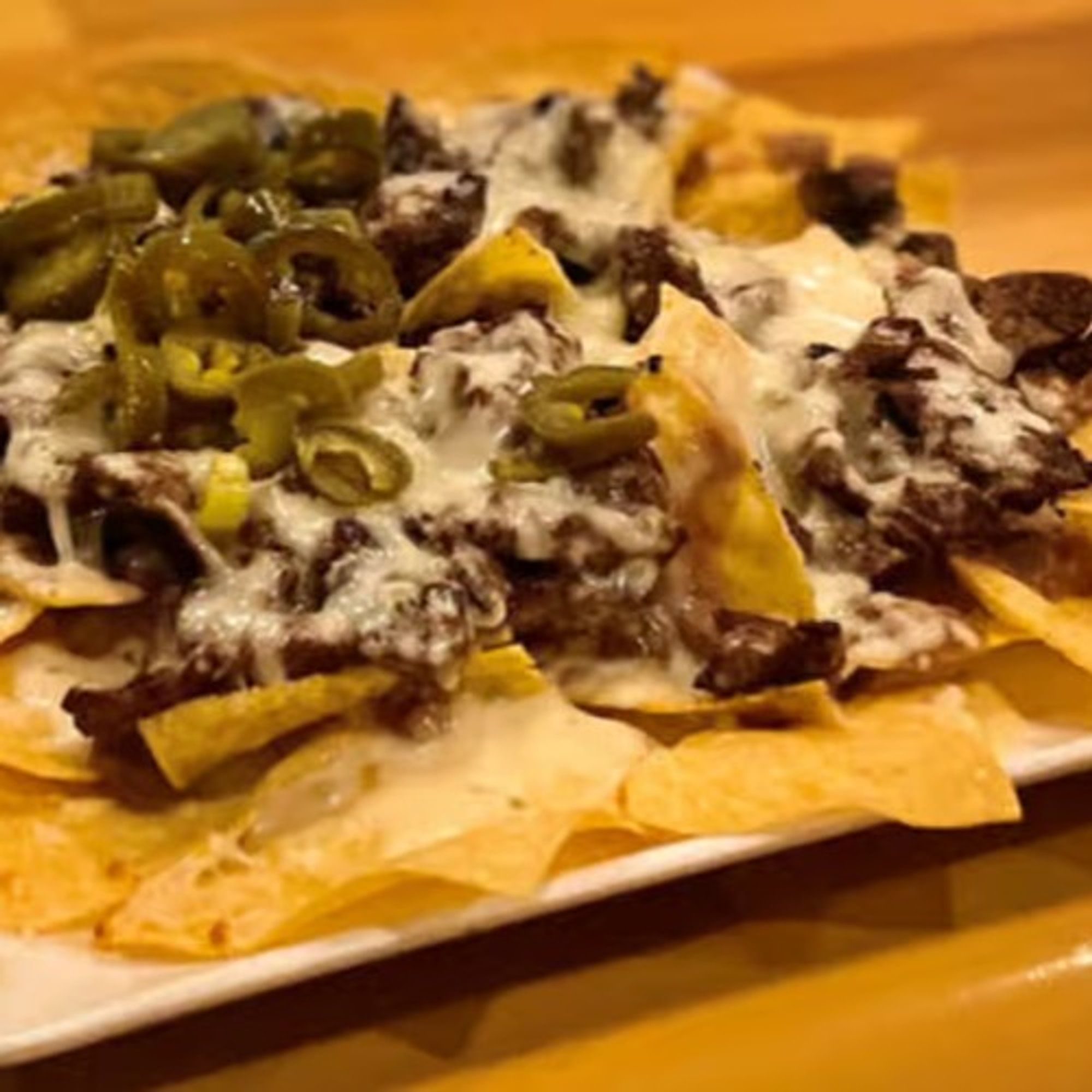40. Nachos Steak, Beans and Cheese