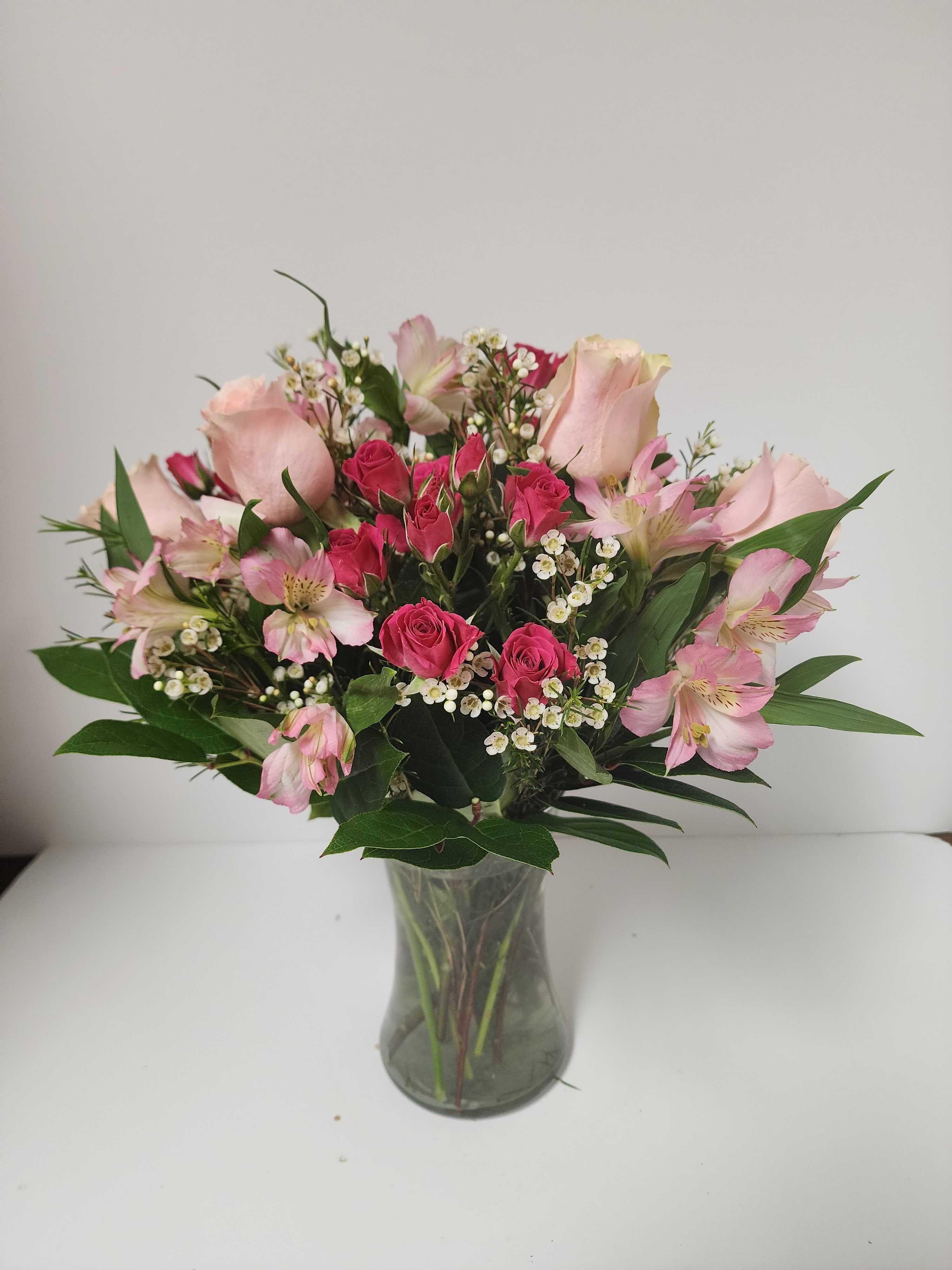 Pink rose and alstroemeria arrangement by Country Greenery at The Galleria