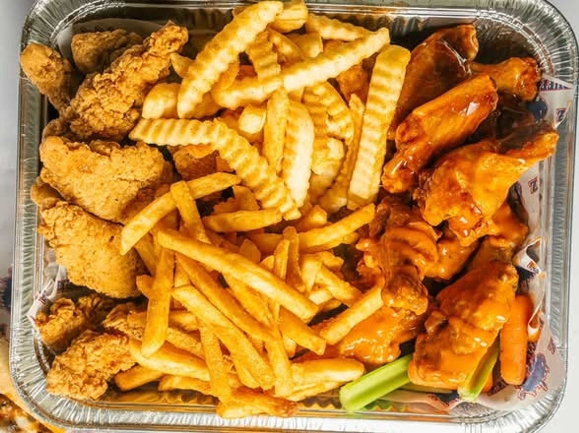 16 Wings, 10 Chicken Fingers and 2 Fries