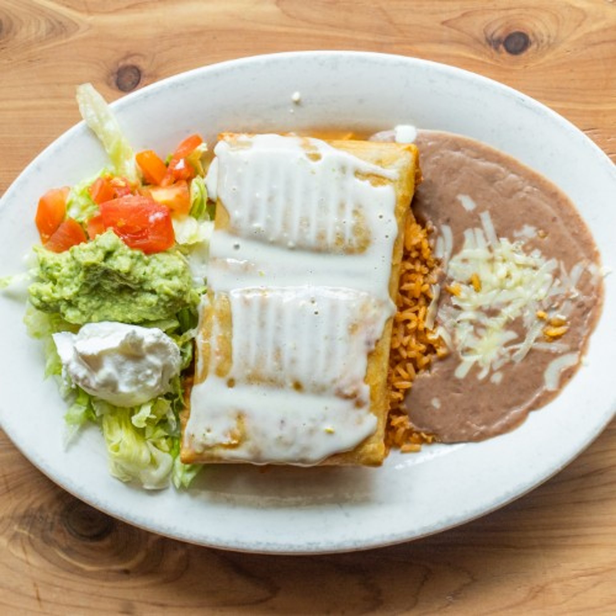 Chimichanga (Beef or Chicken), Rice, and Beans
