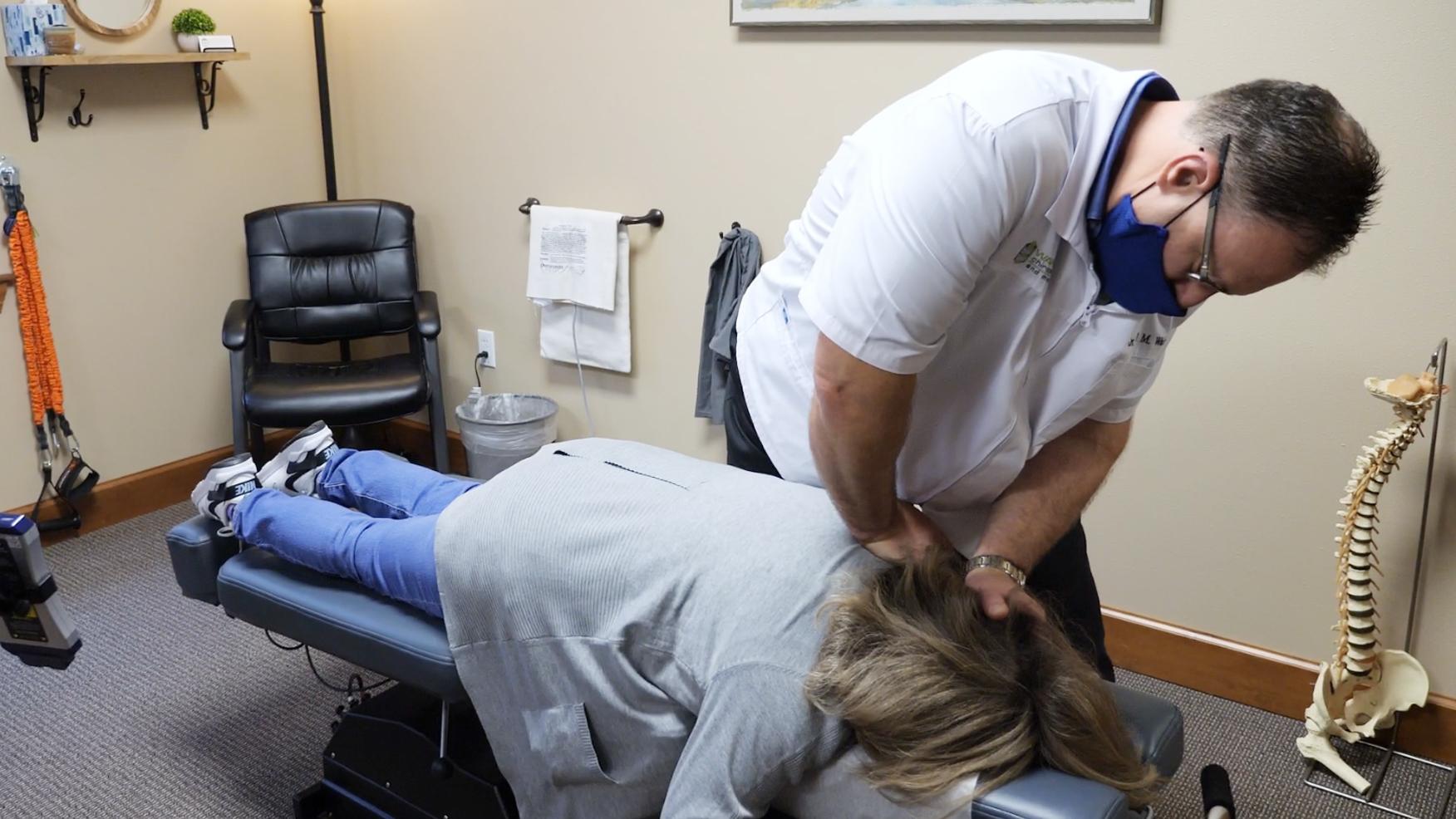 Chiropractic adjustment for neck and back pain Lacey WA