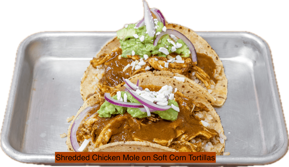 Shredded Chicken Mole Tacos, Pickled Onions, Avocado Hummus, Shredded PB Cheese