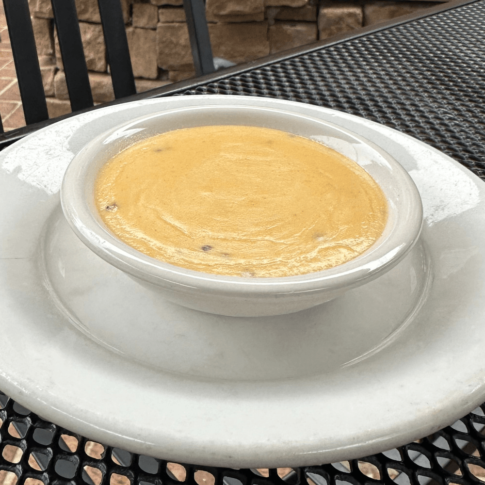 *Cup of Cheese Sauce*
