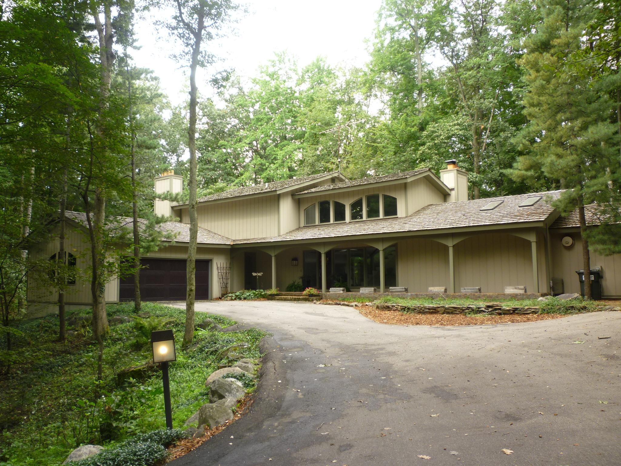 Every Window Shows Off the Natural Surroundings on 1.6 Acres. All Spacious Rooms Throughout. Formal Dining Area, Open Kitchen w/Large Center Island, Eating Area w/Bay Window, a Wall of Pantries. Family Room with a Raised Hearth and an Entire Wall of Fieldstone. Slider to a Large Deck for Fabulous Entertaining and Grilling. Master Suite w/Fireplace, Granite Counters, Separate Shower and Whirlpool Bath, Heated Floor. 