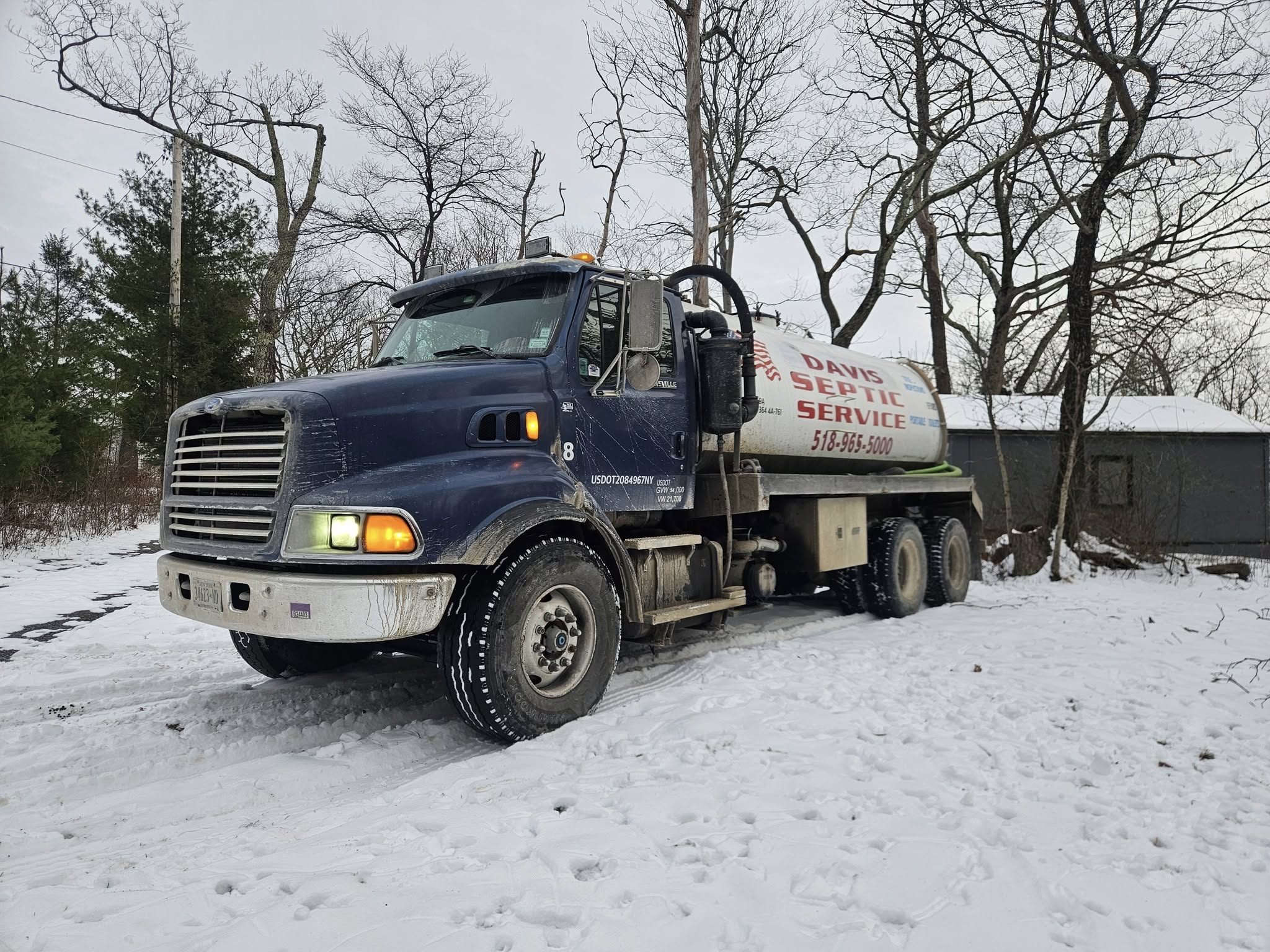 Davis Property Maintenance LLC Logo