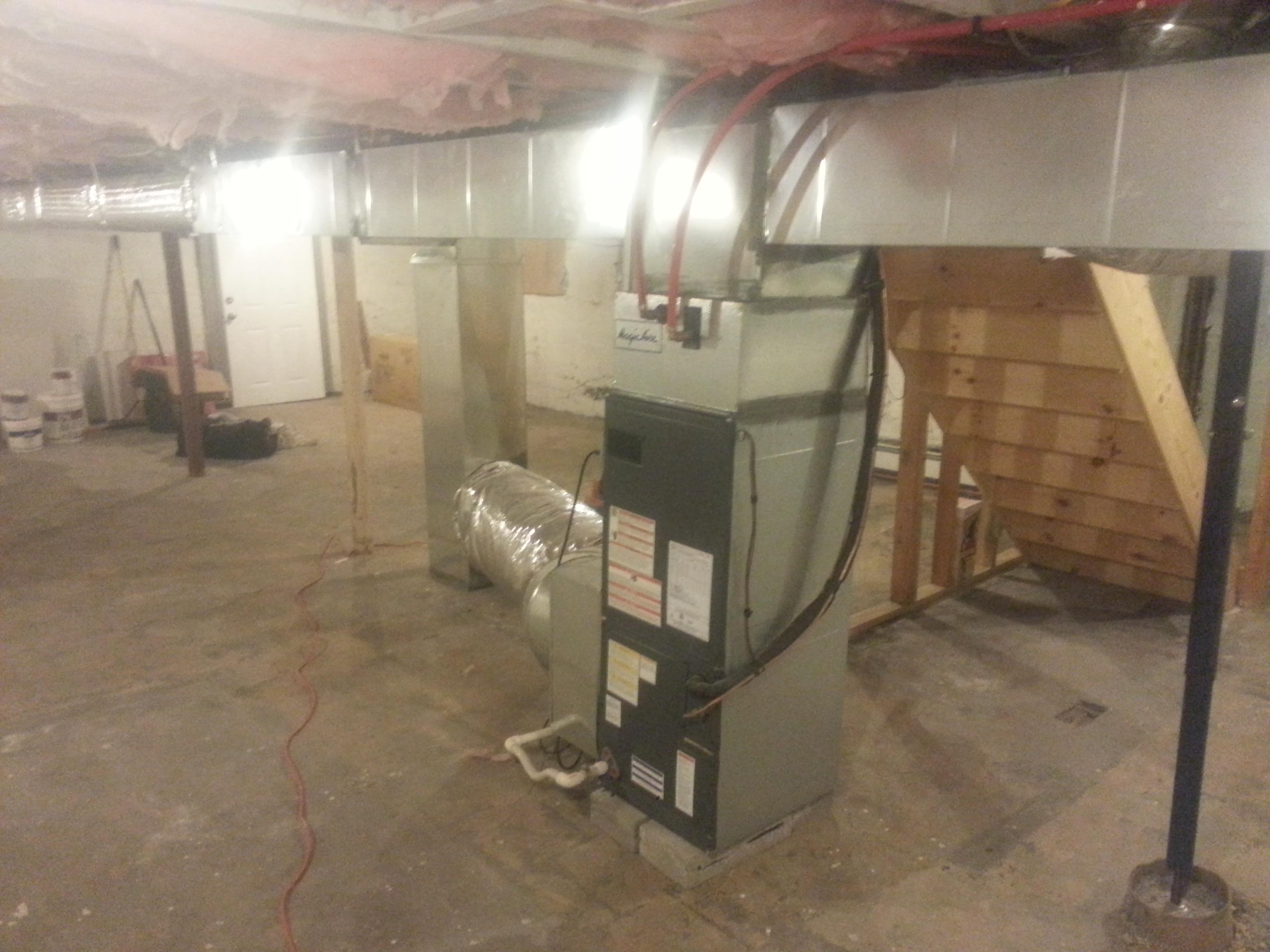 We made it possible for this customer to finish his 7' basement by keeping all branch ducts recessed above the joists.