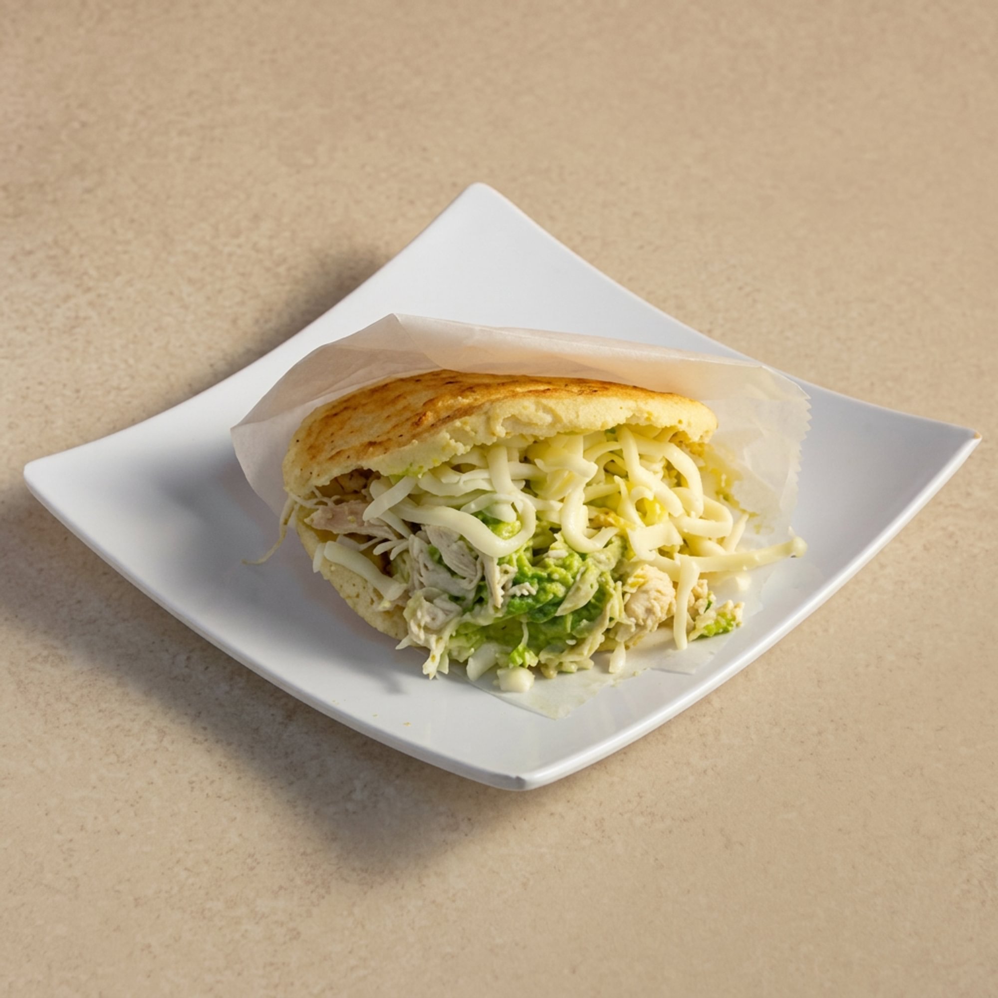 Arepa Reina Pepiada (Chicken and Avocado Cornmeal Sandwich)